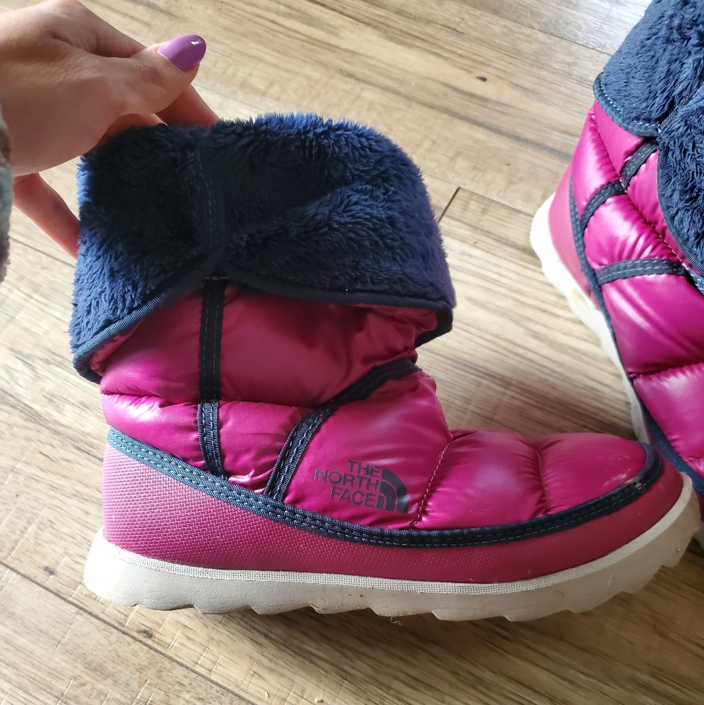 The north face purple puffer boots